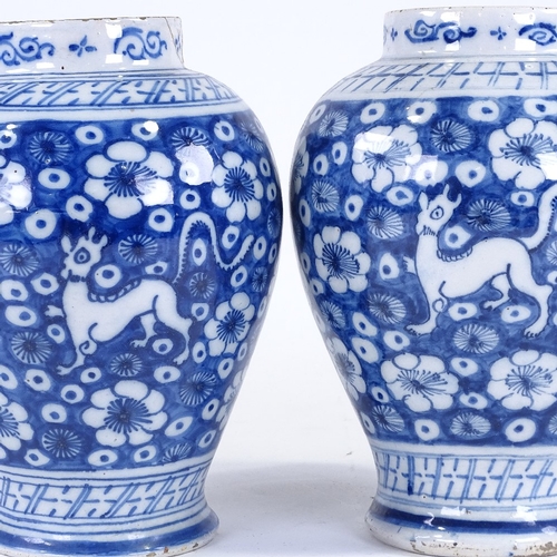 125 - A pair of Continental blue and white tin glaze pottery vases, late 18th/early 19th century, height 2... 