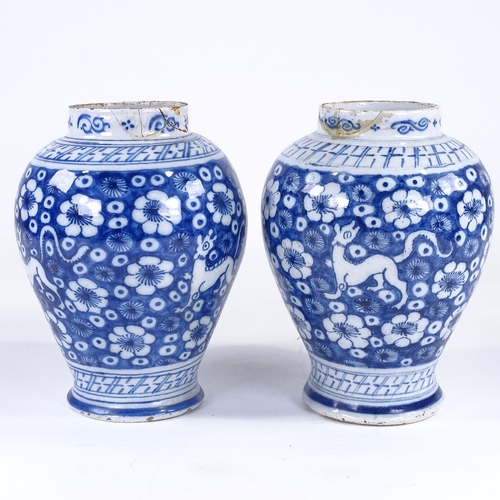 125 - A pair of Continental blue and white tin glaze pottery vases, late 18th/early 19th century, height 2... 