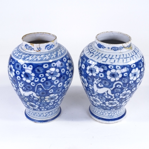 125 - A pair of Continental blue and white tin glaze pottery vases, late 18th/early 19th century, height 2... 