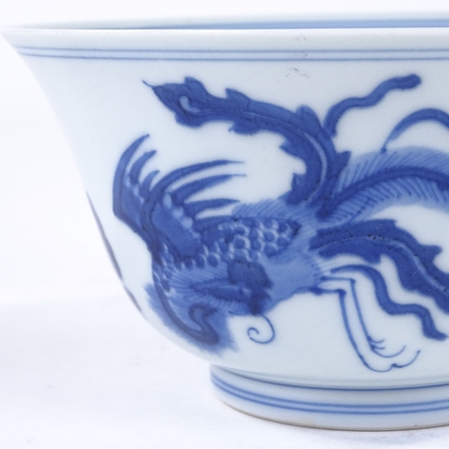 139 - A Chinese blue and white porcelain bowl, hand painted phoenix design, 6 character mark, diameter 16c... 