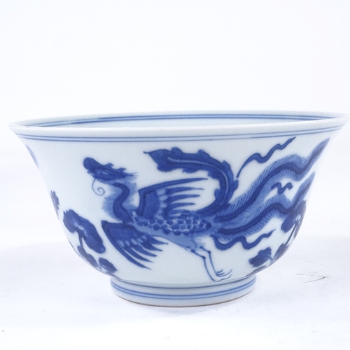 139 - A Chinese blue and white porcelain bowl, hand painted phoenix design, 6 character mark, diameter 16c... 