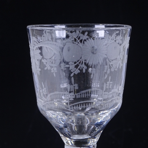 141 - An 18th century cordial glass, with wheel-cut bowl and double helix milk twist stem, height 14.5cm