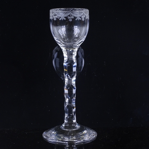 142 - An 18th century cordial glass, with wheel-cut bowl and panel-cut stem, height 16cm