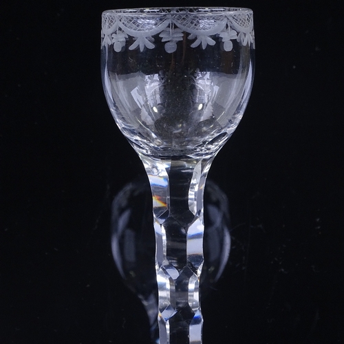 142 - An 18th century cordial glass, with wheel-cut bowl and panel-cut stem, height 16cm