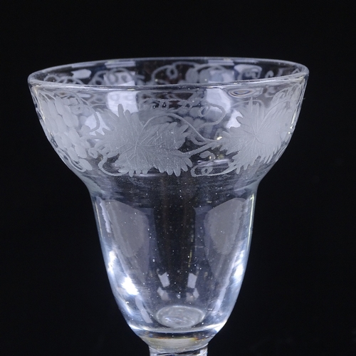 143 - An 18th century cordial glass, with vine decorated wheel-cut bowl and multi-twist stem, height 15.5c... 