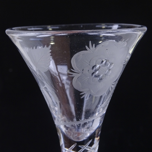 144 - An 18th century cordial glass, with rose design wheel-cut funnel-shaped bowl and multi-twist stem, h... 