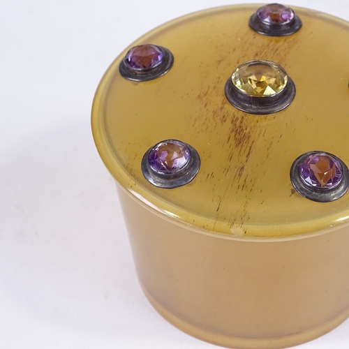 149 - A 19th century Scottish horn box and cover, the lid inset with citrine and amethysts, diameter 8cm