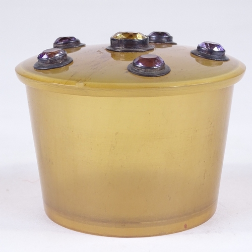 149 - A 19th century Scottish horn box and cover, the lid inset with citrine and amethysts, diameter 8cm