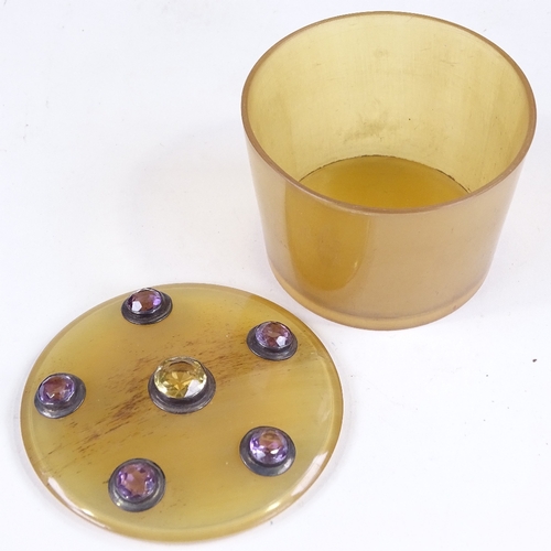 149 - A 19th century Scottish horn box and cover, the lid inset with citrine and amethysts, diameter 8cm