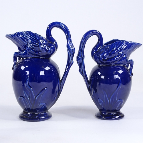 150 - Victorian Aesthetic Movement graduated set of 3 pottery ewers, in the form of swans and bulrushes, c... 