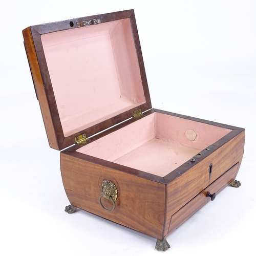 156 - A Regency satinwood jewel box, with brass lion ring handles and lion paw feet, width 22cm