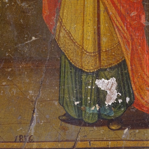 161 - A Russian painted and gilded icon on wood panel, 25cm x 19cm