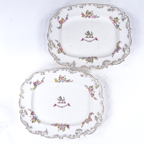 172 - A pair of Chamberlain's Worcester armorial platters in gilded floral decorated surrounds, 31cm acros... 