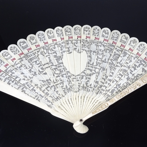 197 - A 19th century Chinese ivory brise fan, finely pierced and relief carved screen, length 19cm