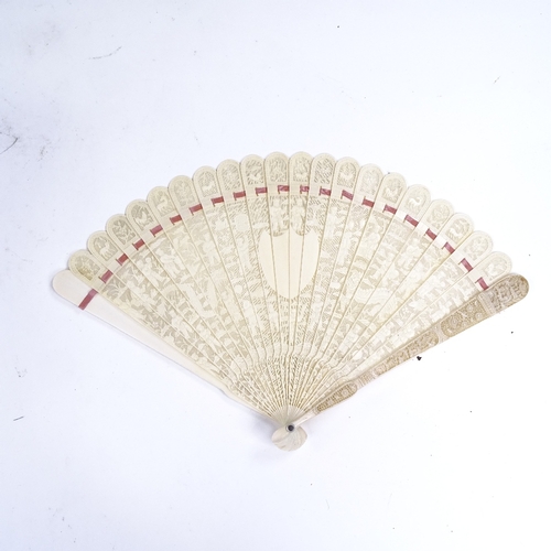 197 - A 19th century Chinese ivory brise fan, finely pierced and relief carved screen, length 19cm