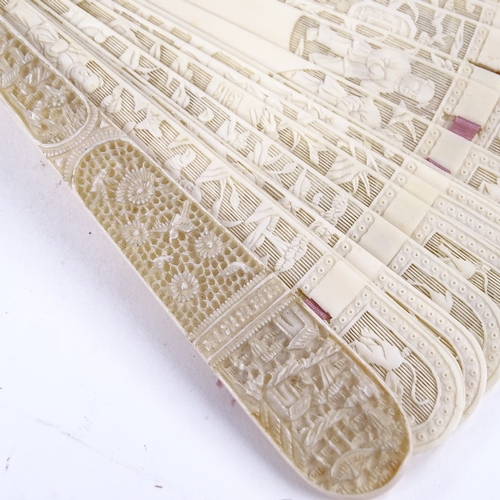 197 - A 19th century Chinese ivory brise fan, finely pierced and relief carved screen, length 19cm