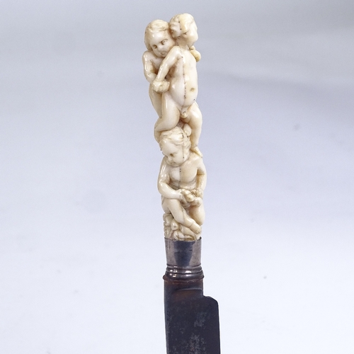 198 - A George III knife with carved ivory cherub design handle, length 18cm