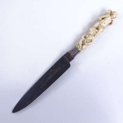 198 - A George III knife with carved ivory cherub design handle, length 18cm