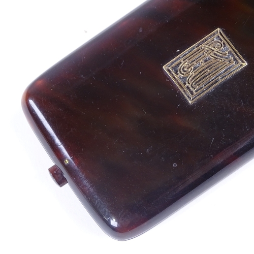 203 - An early 20th century tortoiseshell card case, with gold inlaid lid, 8cm x 5cm