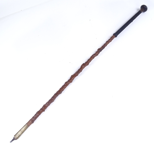 206 - A 19th century rootwood walking stick, with woven handle and horn end