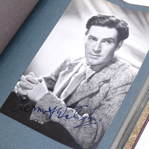 210 - An album of film star postcards, most with original pen signatures, including John Mills, Margaret L... 