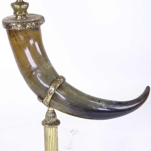 221 - A brass and buffalo horn oil lamp, with opaque glass shade, height to top of shade 75cm