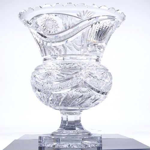 228 - A large and heavy cut-glass thistle-shaped table centre bowl, on octagonal base, diameter 35cm, heig... 