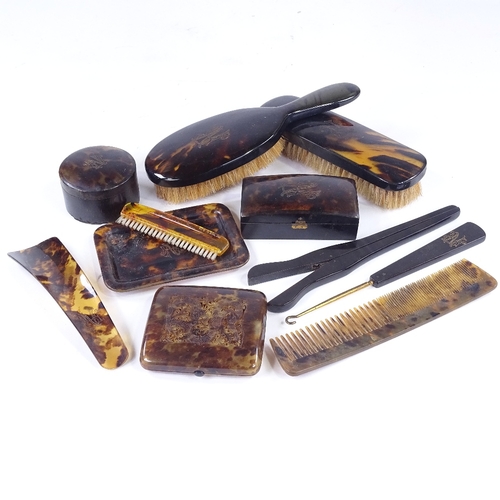 229 - A group of tortoiseshell items, including 2 boxes, a cigarette case, dressing table items etc