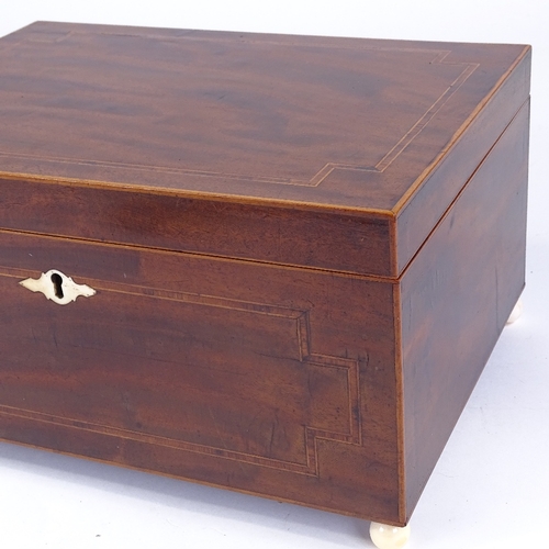 249 - A Georgian banded mahogany sewing box, on ivory feet, with tray fitted interior, width 33cm