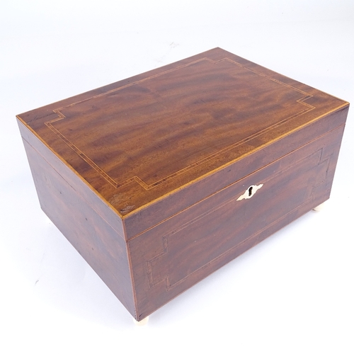 249 - A Georgian banded mahogany sewing box, on ivory feet, with tray fitted interior, width 33cm