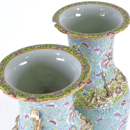 256 - A pair of Chinese porcelain vases, with painted enamel decoration and gilded dragon necks, height 47... 