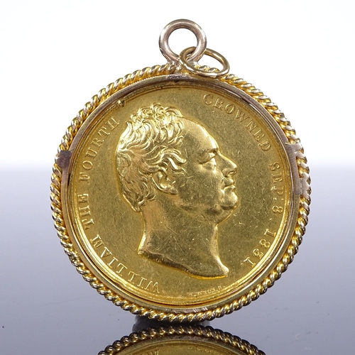 263 - A 22ct gold King William IV and Queen Adelaide Coronation medallion, designed by William Wyon, in un... 