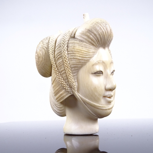 267 - A Japanese ivory carving, head of a woman, Meiji Period circa 1900, height 7cm