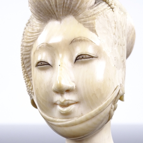 267 - A Japanese ivory carving, head of a woman, Meiji Period circa 1900, height 7cm