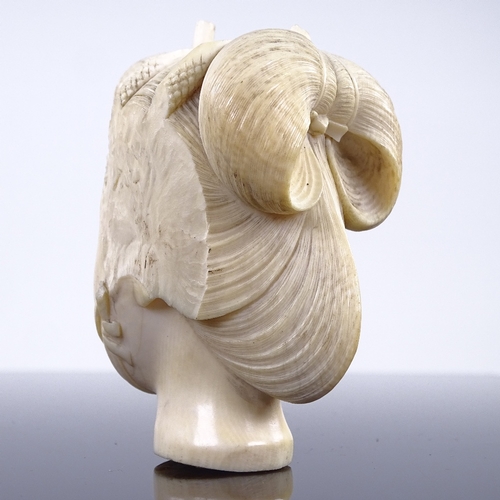 267 - A Japanese ivory carving, head of a woman, Meiji Period circa 1900, height 7cm