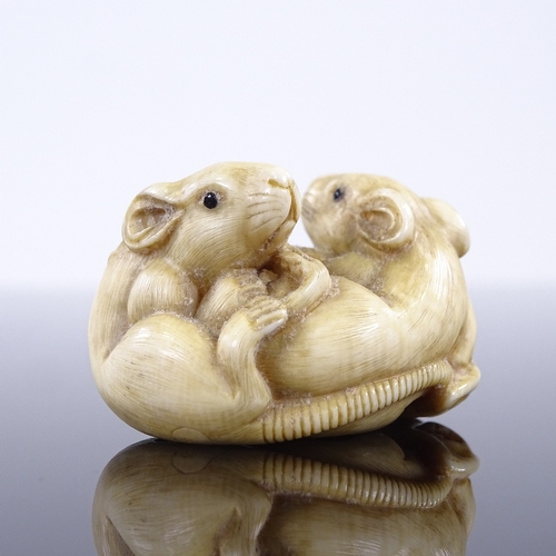 271 - A 19th century Japanese ivory netsuke, depicting 3 rats, 4cm across