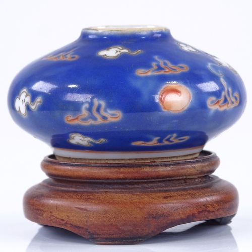 288 - A small Chinese porcelain brush pot, with painted dragon design, diameter 6cm