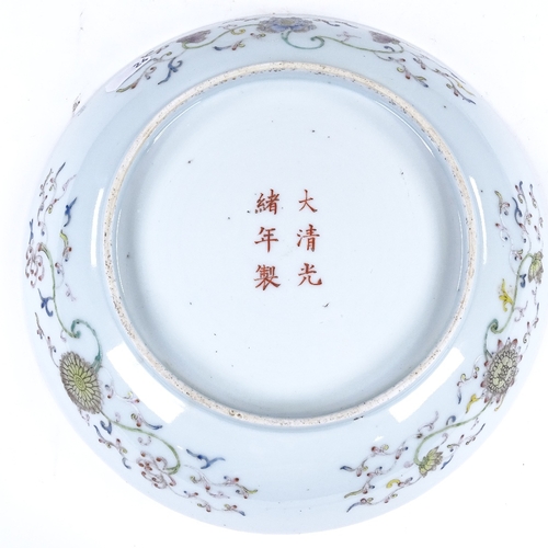 292 - A Chinese porcelain bowl with painted polychrome dragon designs, 6 character mark, diameter 24cm