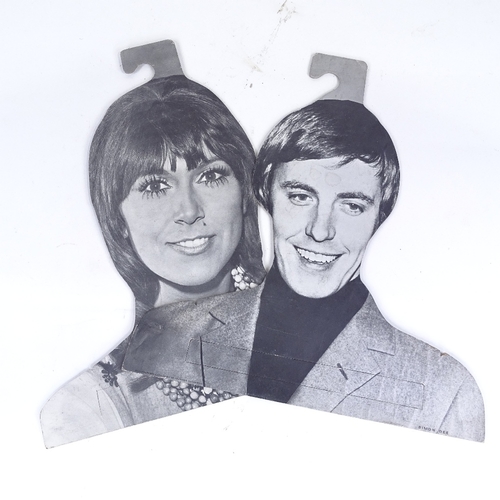 297 - WITHDRAWN A rare set of 7 1960s cardboard shop display clothes hangers with photographic portraits o... 