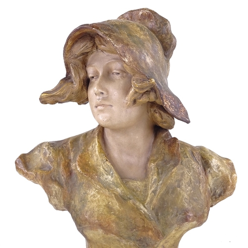 298 - GOLDSCHEIDER - painted pottery bust of a woman wearing a bonnet, signed Xarinoff, height 35cm