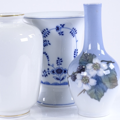 319 - A Royal Copenhagen Blackberry design vase, height 14cm, a KPM white glaze vase, and 1 other (3)