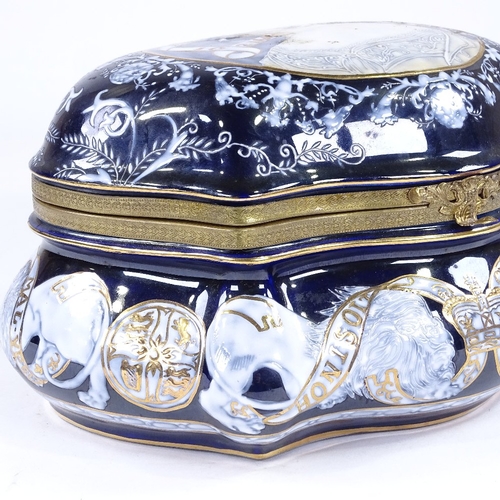 328 - A Continental porcelain box of shaped form, with painted and gilded decoration, width 28cm