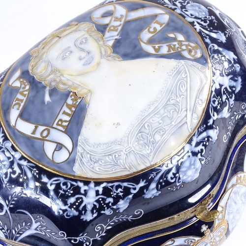 328 - A Continental porcelain box of shaped form, with painted and gilded decoration, width 28cm