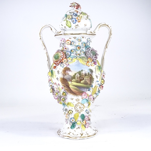 329 - A 19th century Coalbrookdale 2-handled vase and cover, with painted castle scene and encrusted with ... 