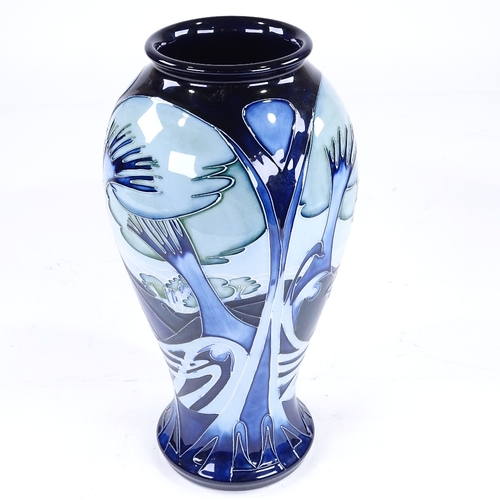 367 - Moorcroft Pottery vase with blue landscape design, 2003, height 32cm