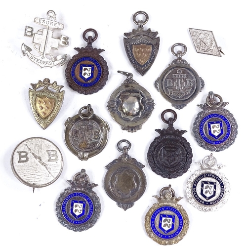 374 - A collection of silver fobs, including some enamel