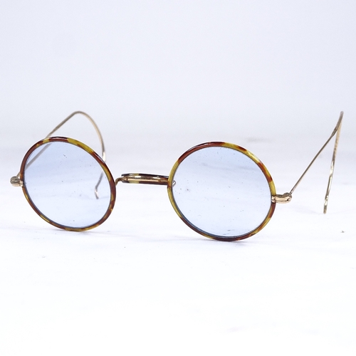 376 - A pair of Vintage tortoiseshell and unmarked yellow metal spectacles