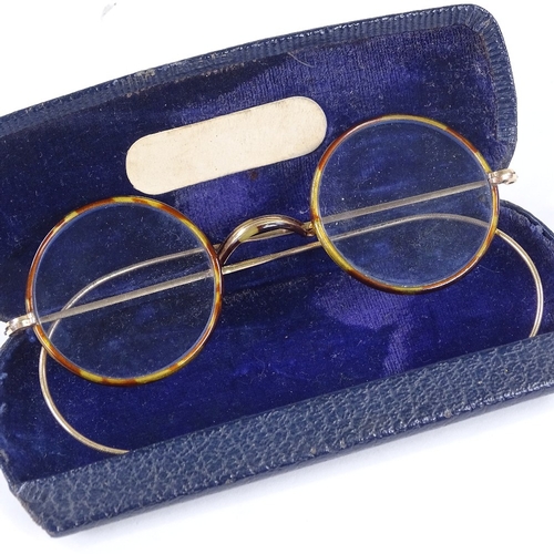 376 - A pair of Vintage tortoiseshell and unmarked yellow metal spectacles