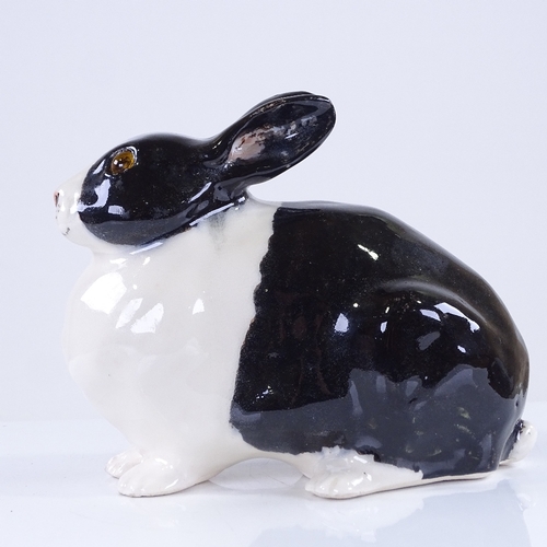 382 - A Winstanley Pottery rabbit, length 17cm