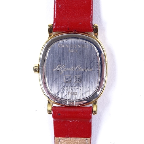 431 - LONGINES - a lady's gold plated stainless steel Les Grandes Classiques quartz wristwatch, ref. 7423,... 